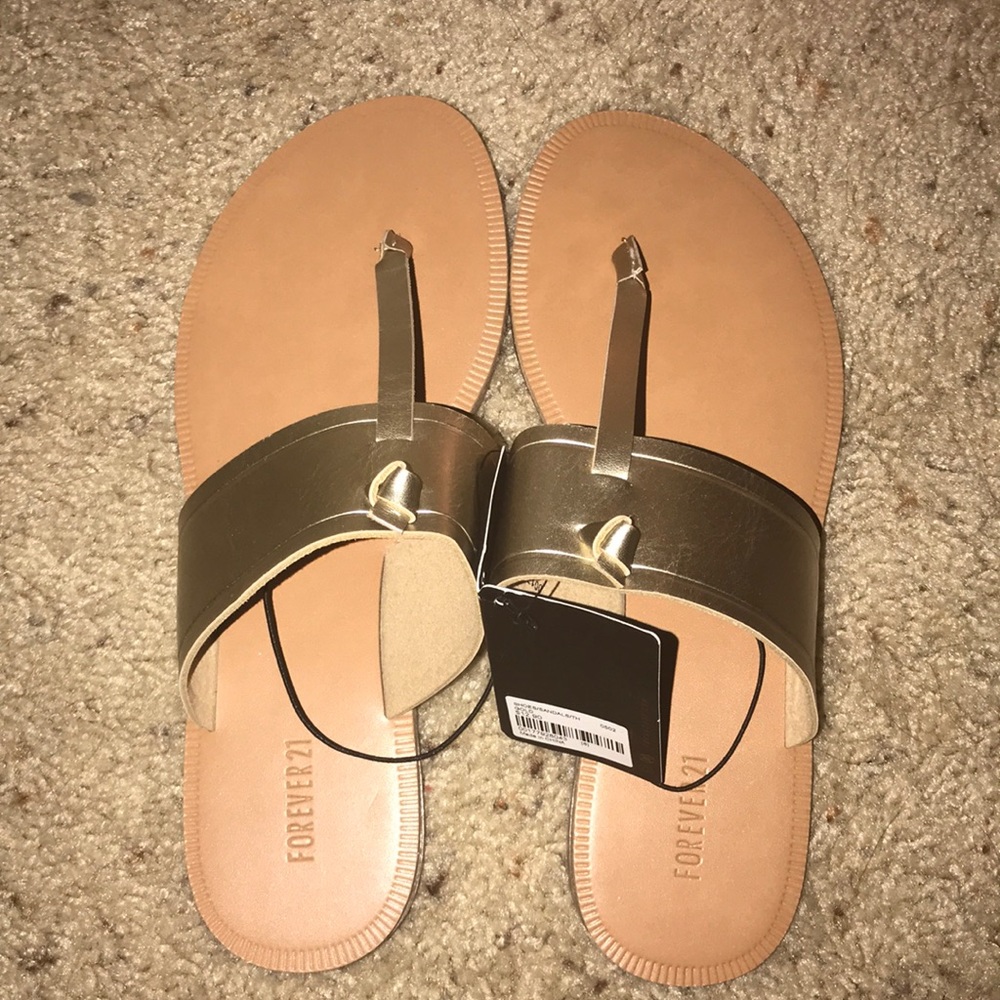 F21 gold and tan sandal. Never worn.